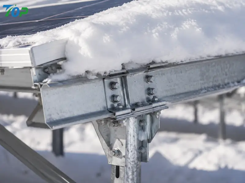Snow drift accumulation causing concentrated load on galvanized steel solar mounting beam connection